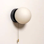 Luminous Glass Globe Wall Light for Modern Spaces