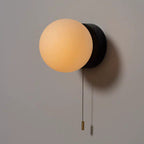 Luminous Glass Globe Wall Light for Modern Spaces