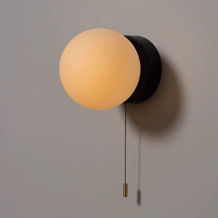 Luminous Glass Globe Wall Light for Modern Spaces