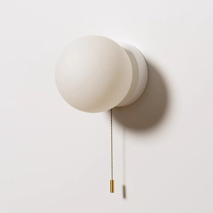 Luminous Glass Globe Wall Light for Modern Spaces