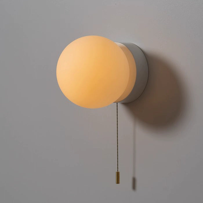Luminous Glass Globe Wall Light for Modern Spaces