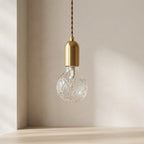 Radiant Elegance: Brass Pendant Light with Crystal Glass Shade