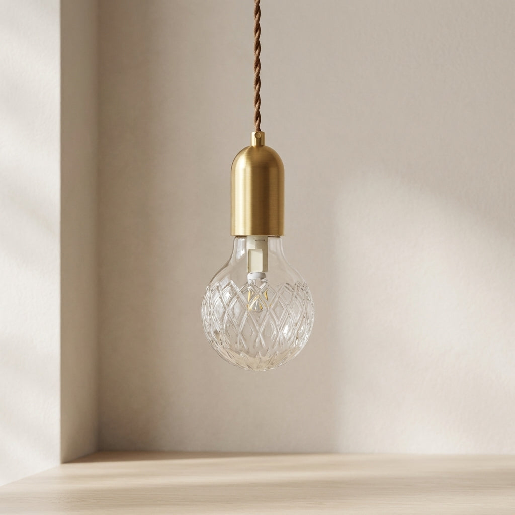 Radiant Elegance: Brass Pendant Light with Crystal Glass Shade