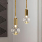 Radiant Elegance: Brass Pendant Light with Crystal Glass Shade