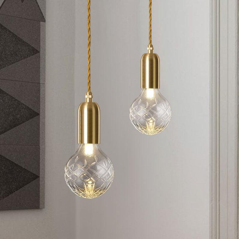 Radiant Elegance: Brass Pendant Light with Crystal Glass Shade