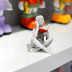 Compact Fine-Detail Resin Bookshelf Figurine