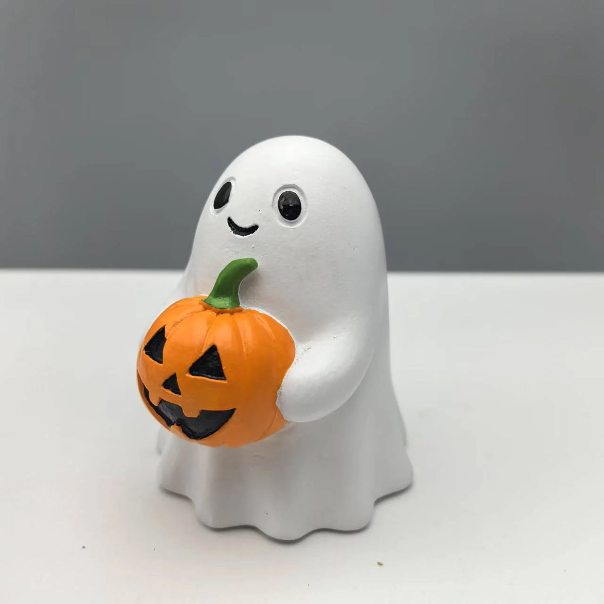 Decorative Figurine Halloween Ghost Holding Pumpkin Indoor & Outdoor