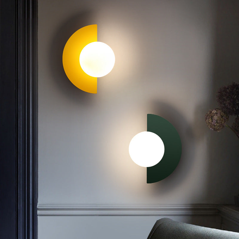 Hand-Finished Glass Globe & Minimalist Iron Frame Wall Sconce