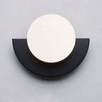 Hand-Finished Glass Globe & Minimalist Iron Frame Wall Sconce