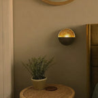 Hand-Hammered Iron Eclipse Wall Candle Holder