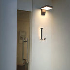 Motion-Activated Adjustable LED Outdoor Wall Sconce