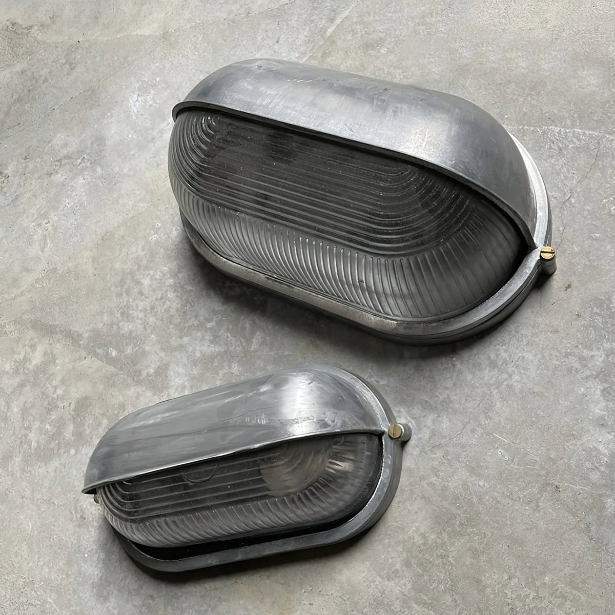 Oval Bulkhead Wall Light Weather-Resistant Galvanized Metal & Ribbed Glass