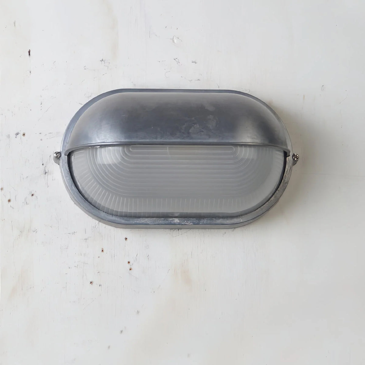 Oval Bulkhead Wall Light Weather-Resistant Galvanized Metal & Ribbed Glass