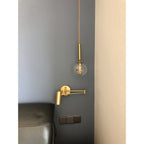 Wall Sconce Adjustable Arm Cylindrical Shade Brass & Black