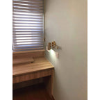 Wall Sconce Adjustable Arm Cylindrical Shade Brass & Black