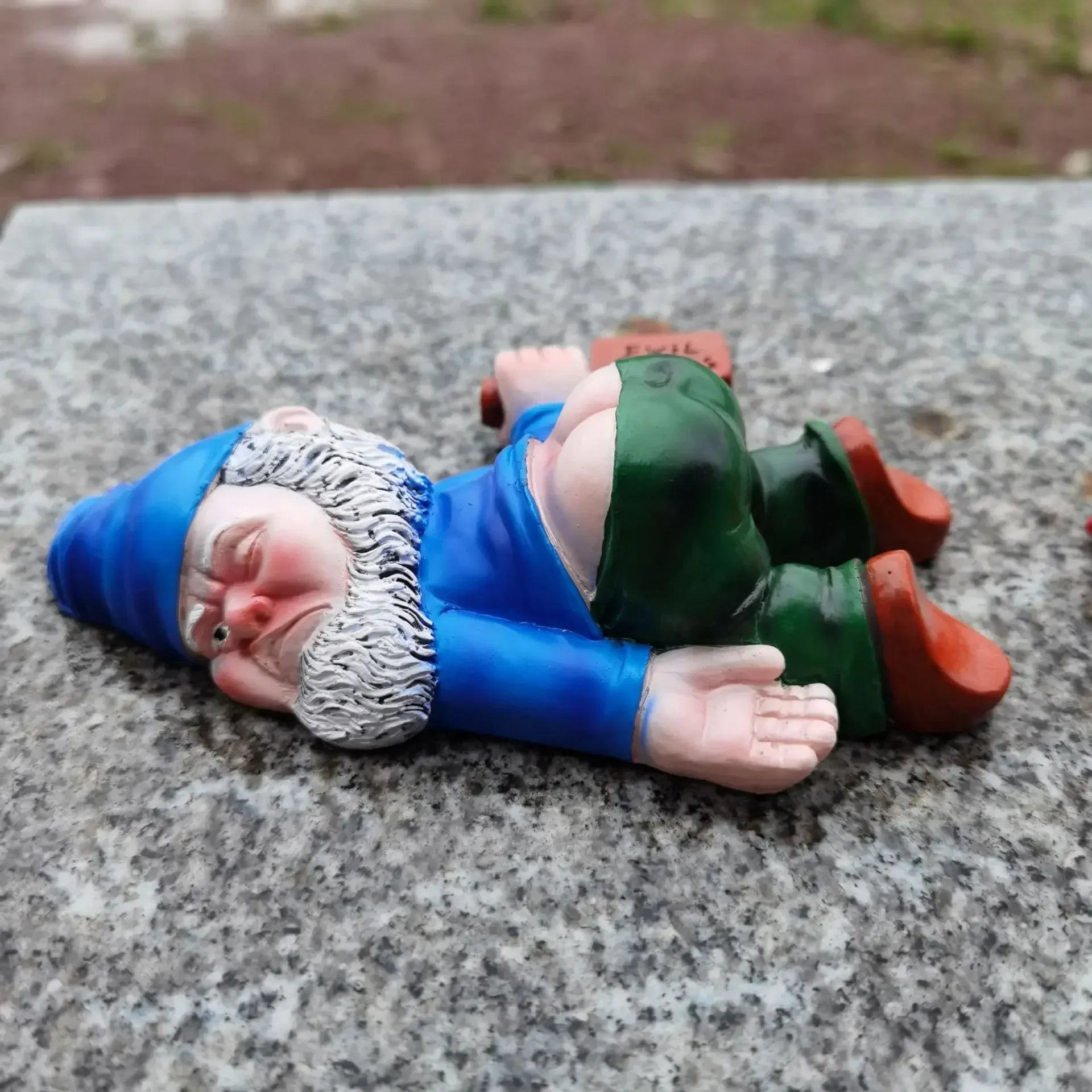 Garden Gnome Figurine with Hat and Bottle - Lying Pose
