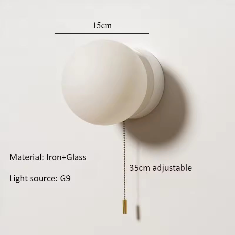 Luminous Glass Globe Wall Light for Modern Spaces