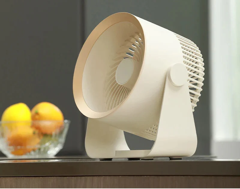 Compact Desk Fan with Adjustable Tilt and Round Air Vent
