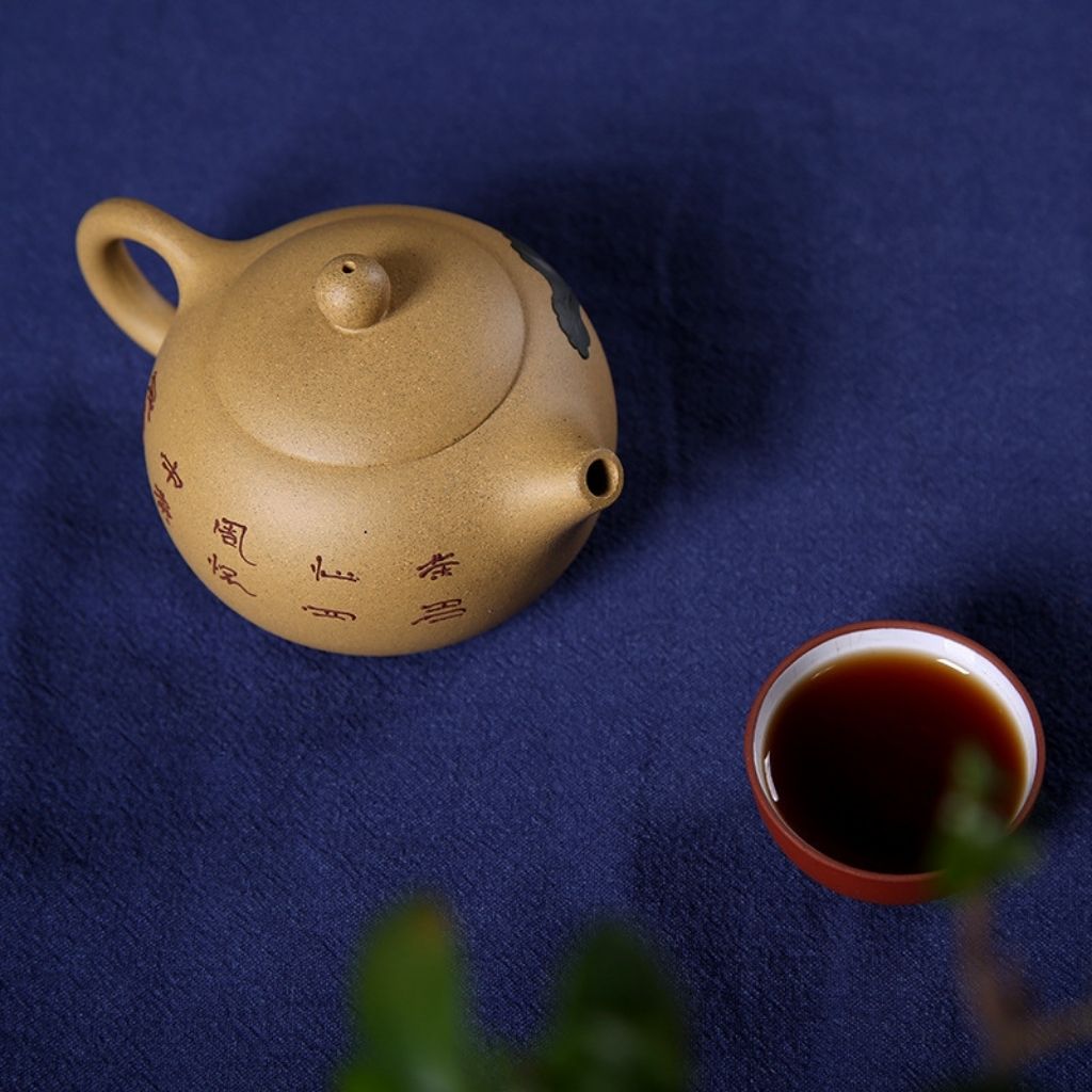 Artisan Crafted Clay Teapot with Hand-Painted Design