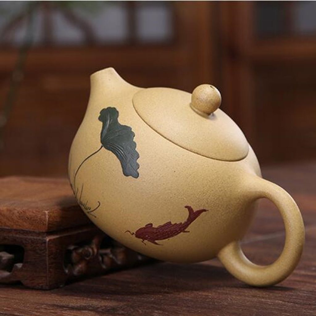Artisan Crafted Clay Teapot with Hand-Painted Design