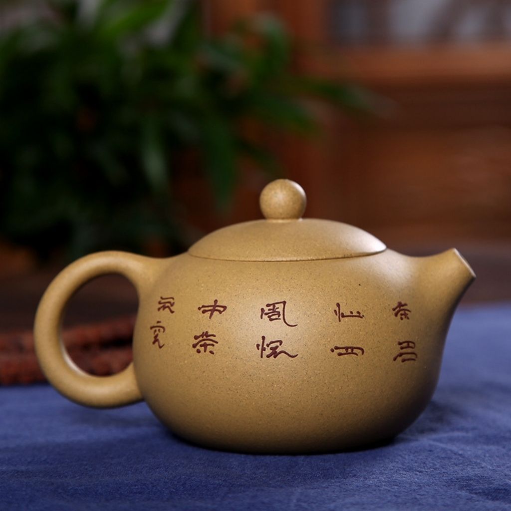 Artisan Crafted Clay Teapot with Hand-Painted Design