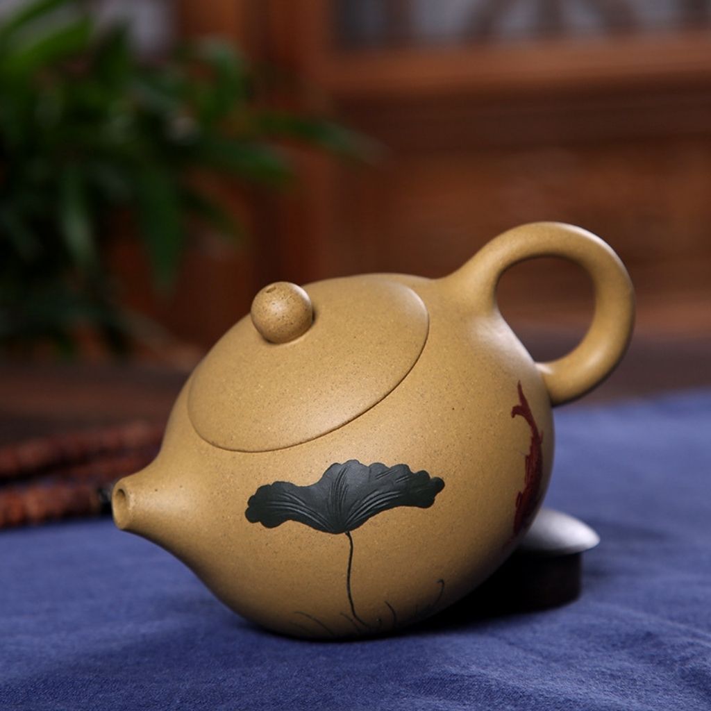 Artisan Crafted Clay Teapot with Hand-Painted Design