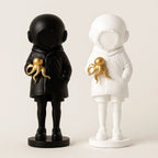 Cosmic Explorer Figurine with Golden Sea Creature