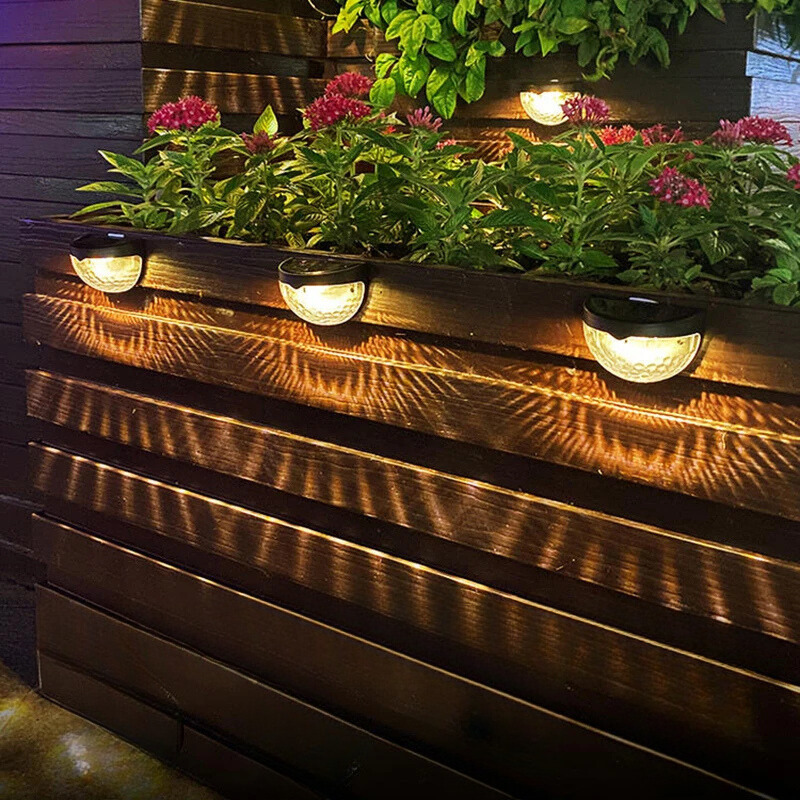 Round Black Solar Wall Light for Outdoor Use with Decorative Pattern