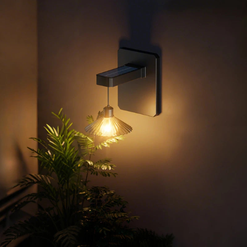 Wall Mounted Outdoor Light Featuring Hanging Shade and Dusk Sensor
