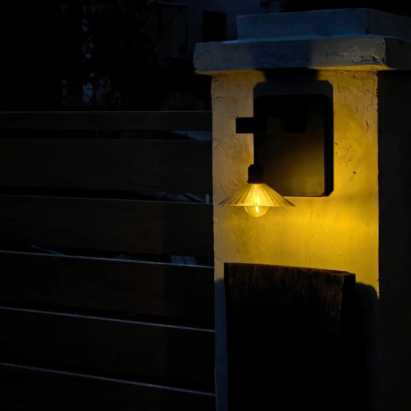 Wall Mounted Outdoor Light Featuring Hanging Shade and Dusk Sensor