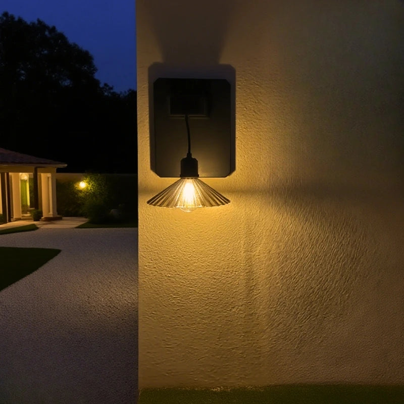 Wall Mounted Outdoor Light Featuring Hanging Shade and Dusk Sensor