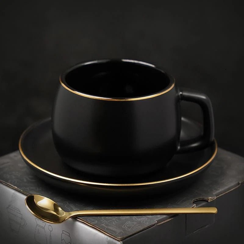 Tea Cup with Saucer Featuring Gold Trim