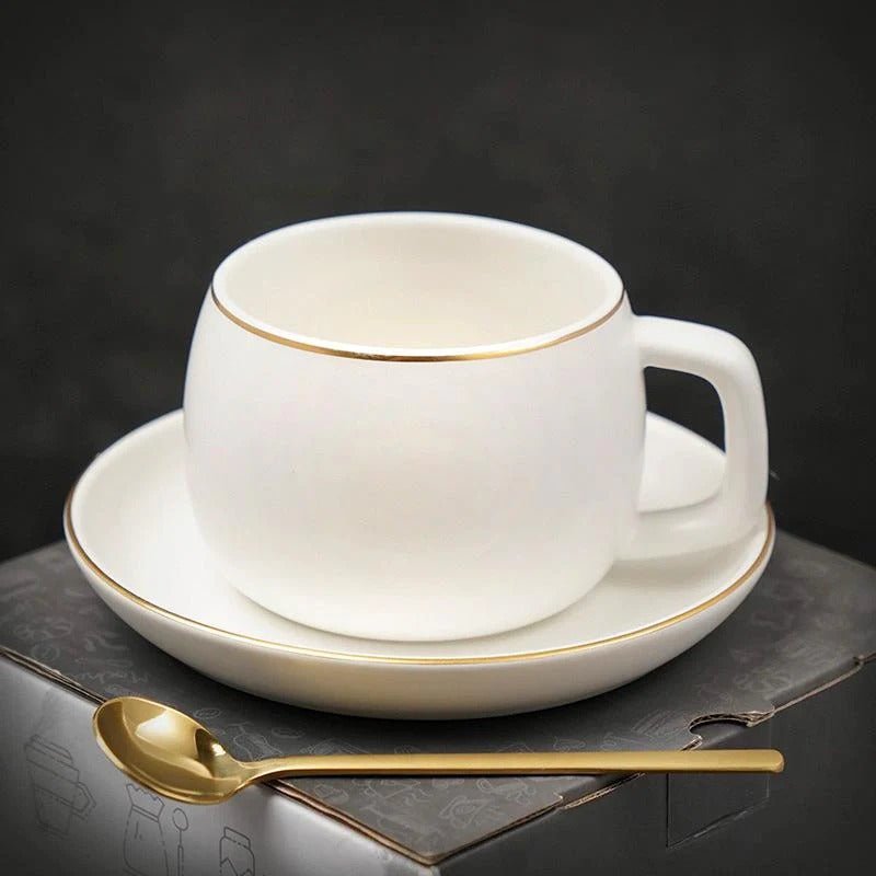 Tea Cup with Saucer Featuring Gold Trim