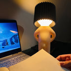 Table Lamp with Pleated Shade in Human Figure Design