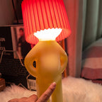 Table Lamp with Pleated Shade in Human Figure Design