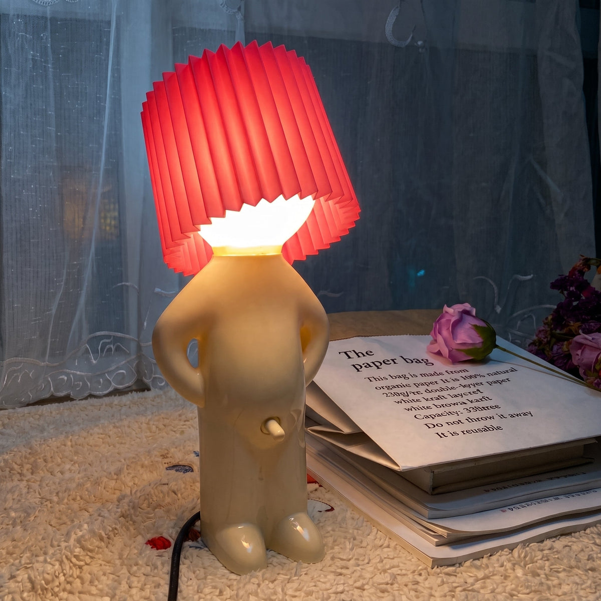 Table Lamp with Pleated Shade in Human Figure Design