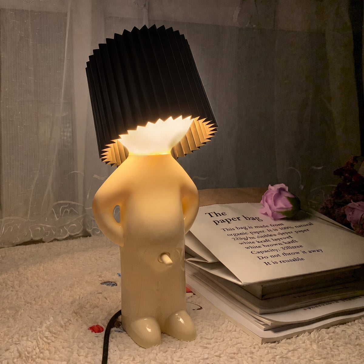 Table Lamp with Pleated Shade in Human Figure Design