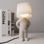 Table Lamp with Pleated Shade in Human Figure Design