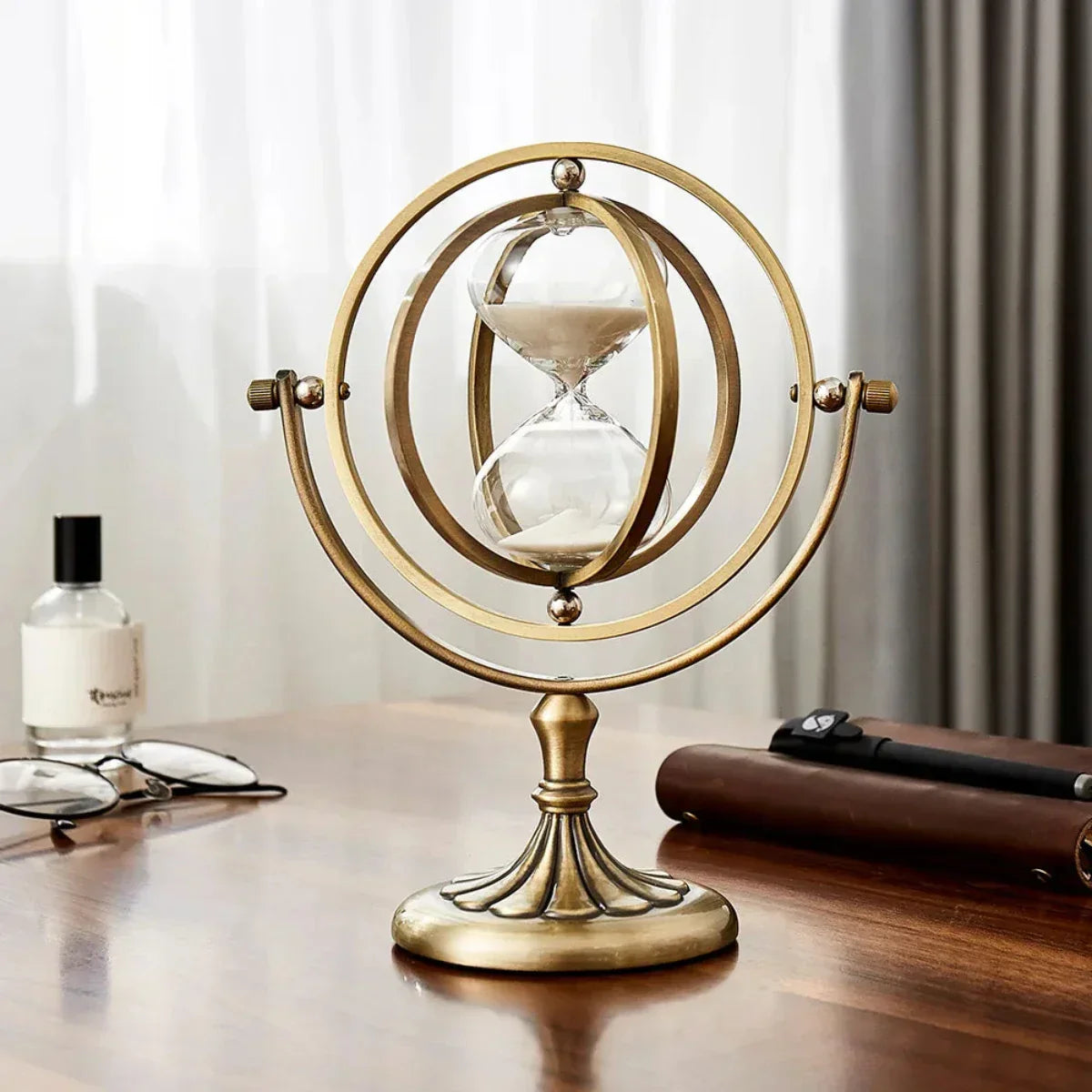 Elegant Sand Timer with Hourglass Design and Metal Frame