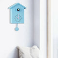 Cuckoo Wall Clock in House Design with Pendulum Feature