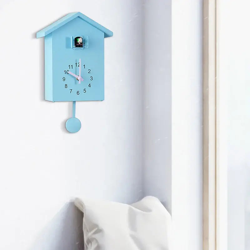Cuckoo Wall Clock in House Design with Pendulum Feature