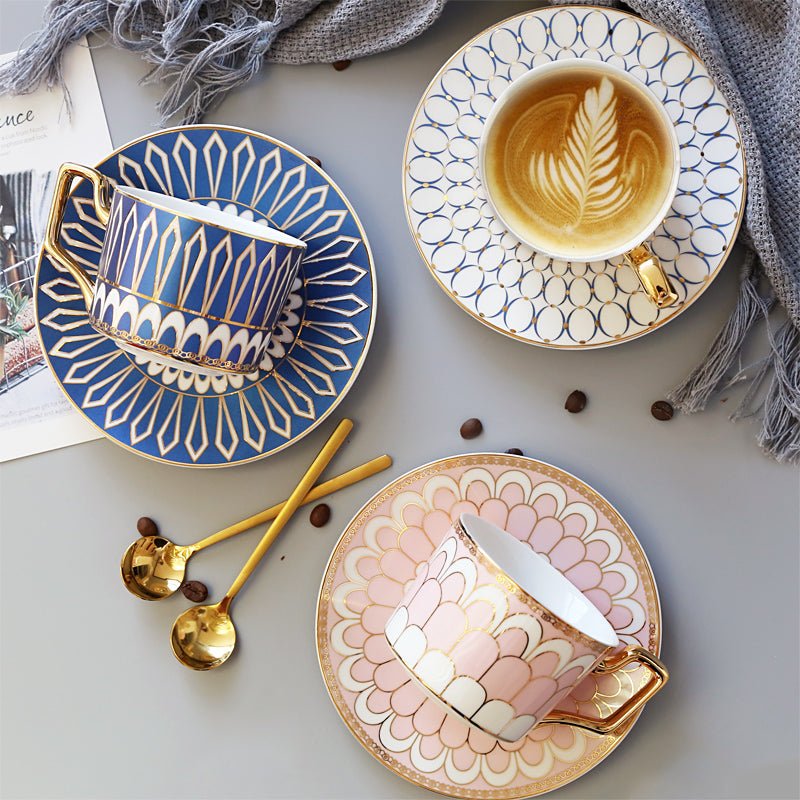 Decorative Tea Cup Set featuring Gold Handles and Matching Saucers