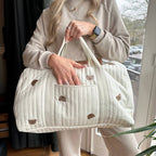 Embroidered Design Travel Bag with Quilted Texture