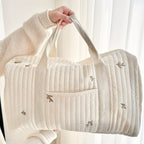 Embroidered Design Travel Bag with Quilted Texture