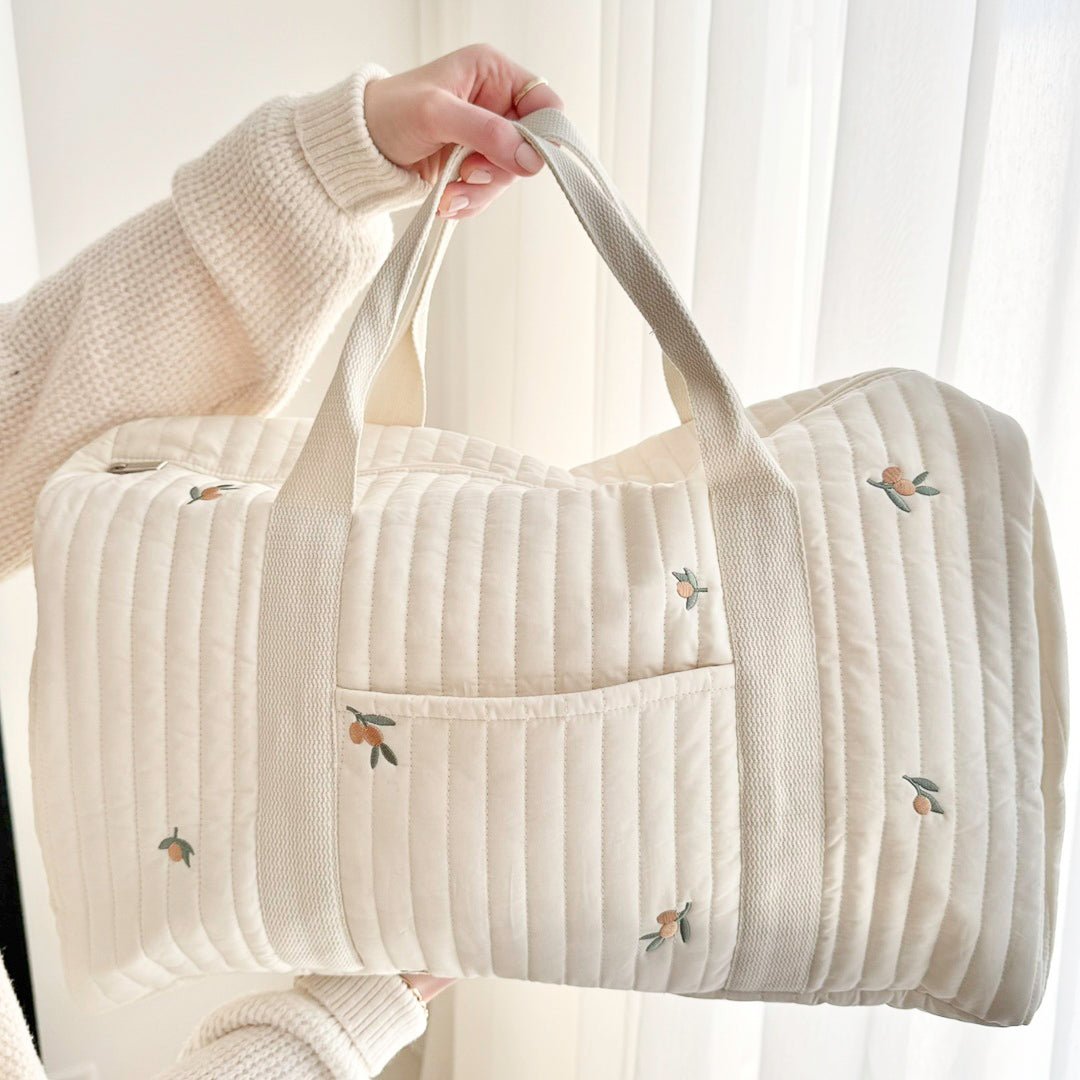 Embroidered Design Travel Bag with Quilted Texture