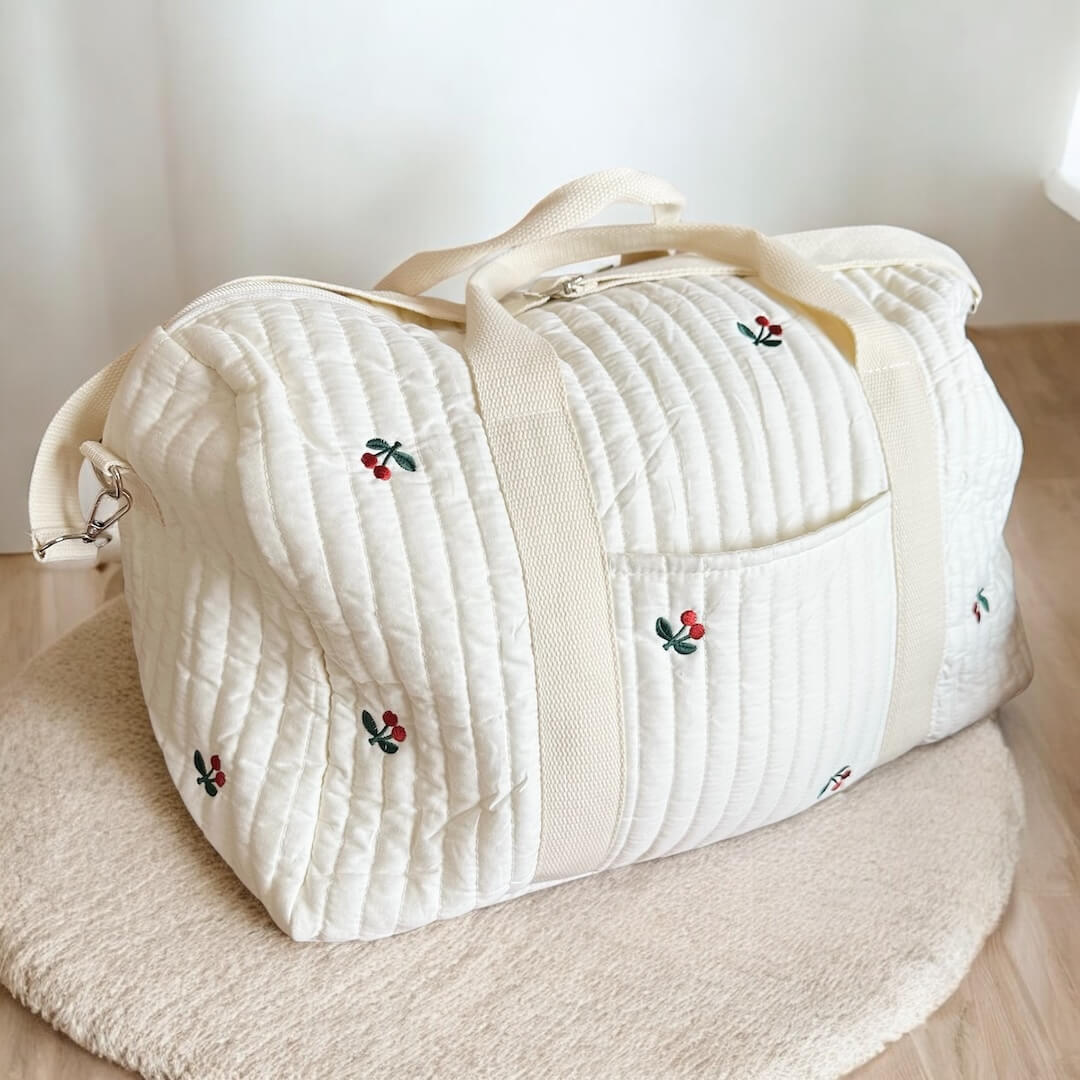 Embroidered Design Travel Bag with Quilted Texture