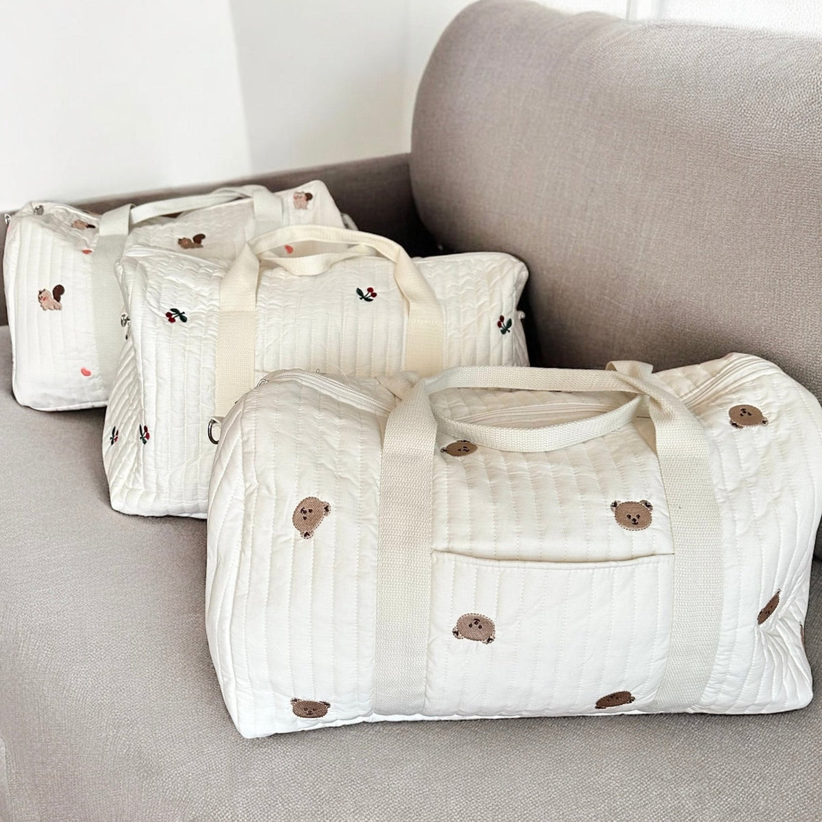 Embroidered Design Travel Bag with Quilted Texture